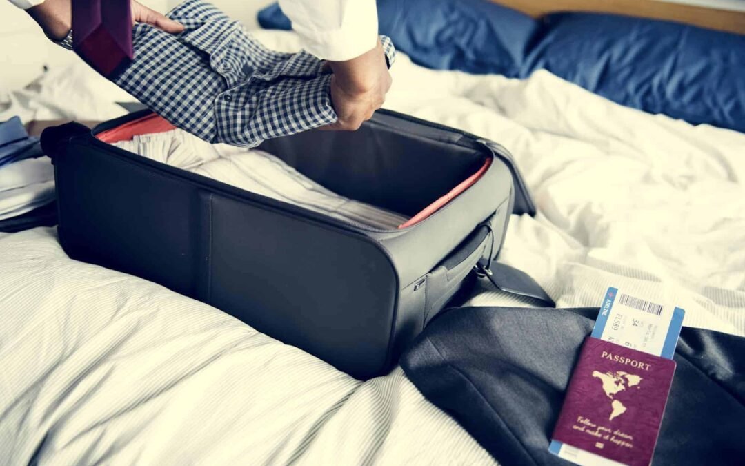 A man preparing his suitcase for travel